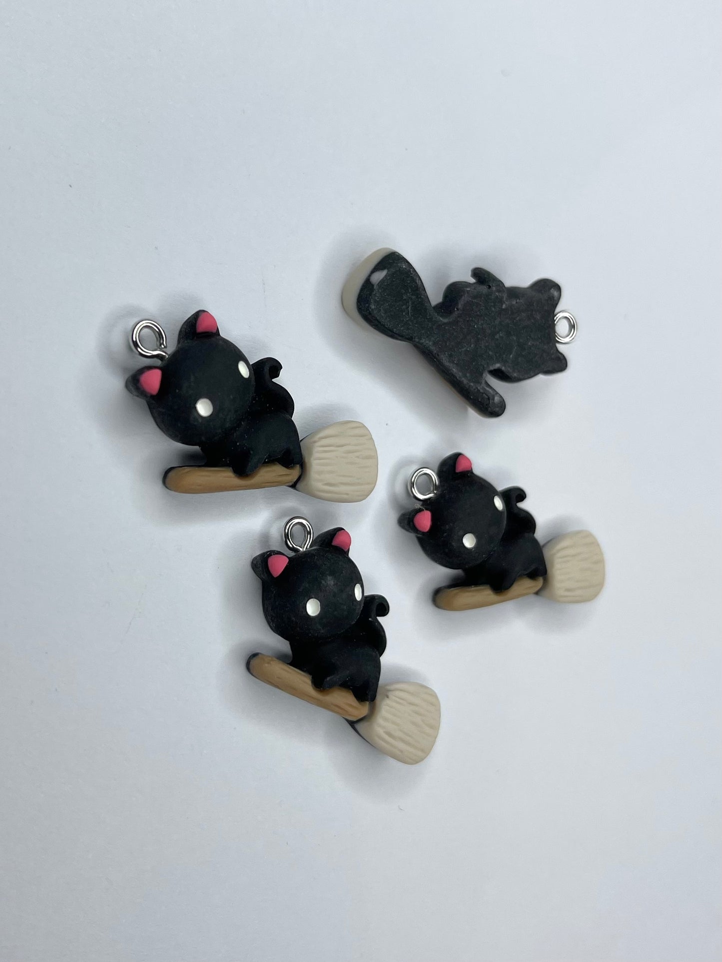 Black Cat on Broom Charm