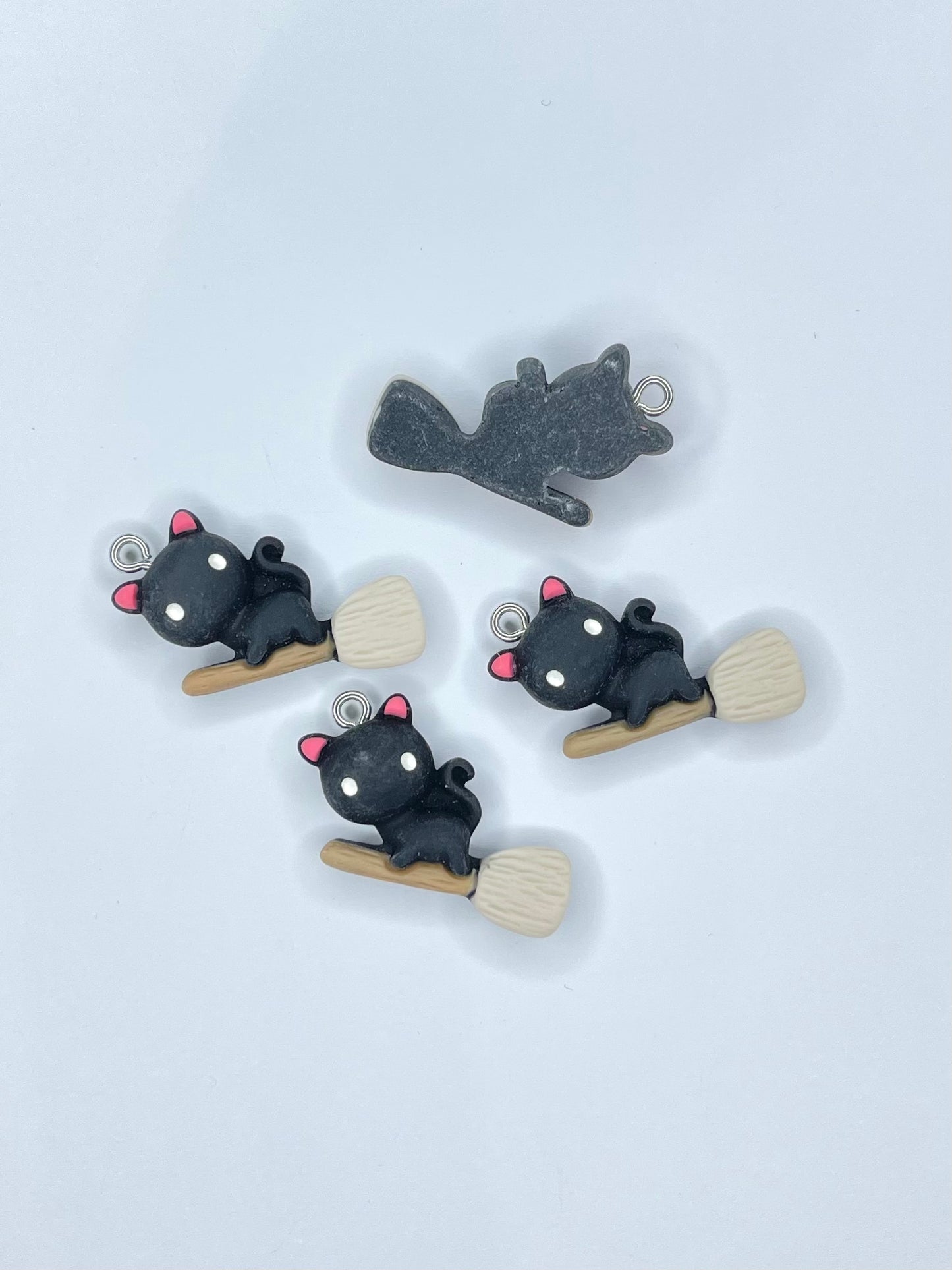 Black Cat on Broom Charm